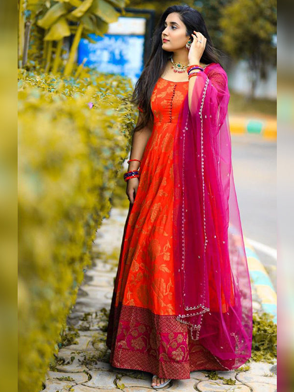 Orange Silk Gown With Net Dupatta